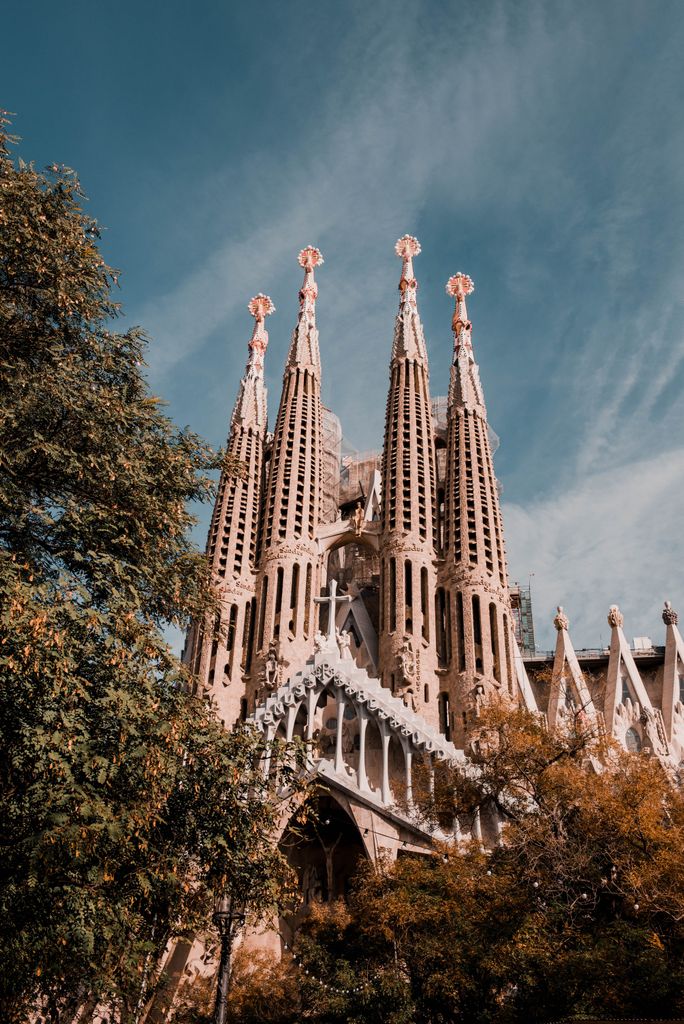 Stunning view of the iconic Sagrada Familia under a clear sky in Barcelona.